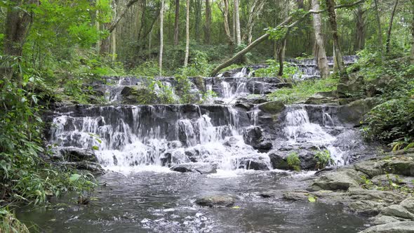 Beautiful stream and waterfall in tropical forest at Namtok Samlan National Park