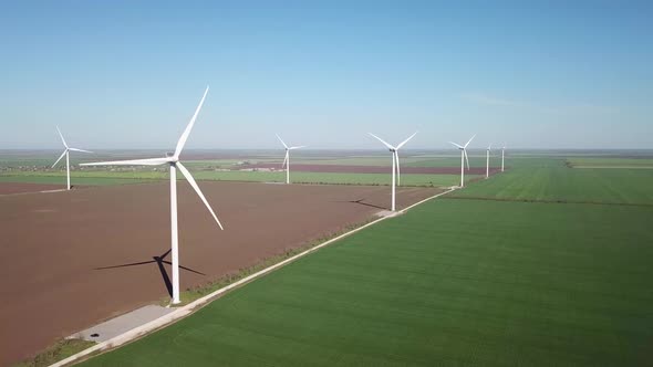 Wind power station on the field. Concept and idea of alternative energy development alt