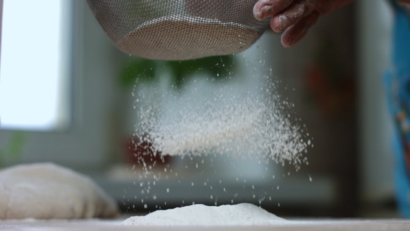 Flour Is Poured Through A Sieve