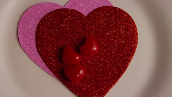 Rotating stock footage shot of Valentines decorations and candies - VALENTINES 0119 alt