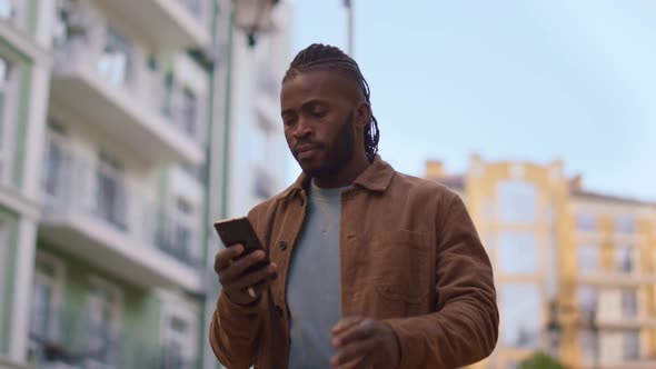 Casual Man Making Phone Call Walk City Street Portrait alt