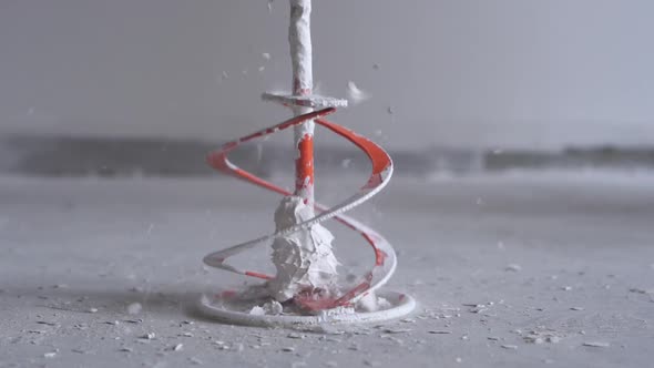 Beauty Slow Motion - Cleaning Nozzle-mixer on the Drill From the Frozen Solution of Putty