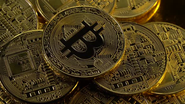 Beautiful Bitcoins Are Spinning Top View. Close Up alt