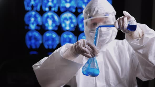 Doctor works in laboratory testing medicine, vaccine. Searching for coronavirus COVID-19 vaccine. alt