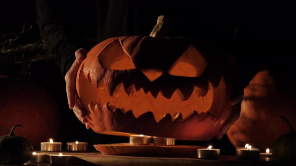 Carved Halloween Pumpkin Lights Inside with Flame