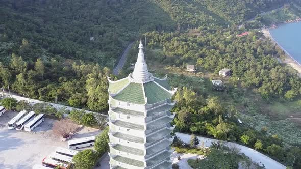 Aerial View Buddhist Temple Pagoda with Bus Parking Lot alt