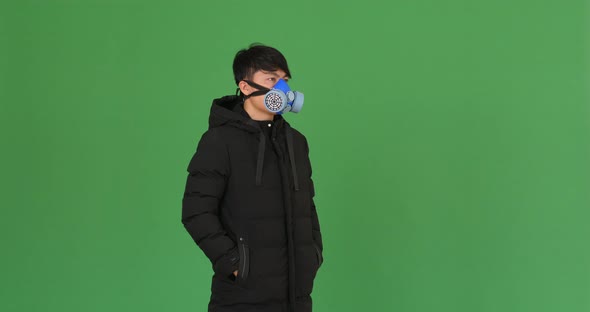 Young Boy In Protective Mask, Green Screen alt