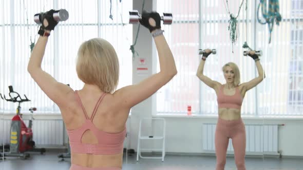 Young woman training in a sports club