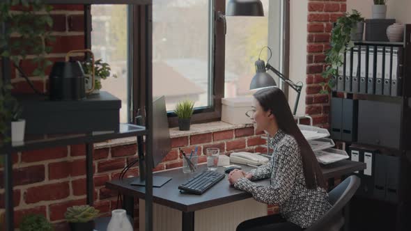 Entrepreneur Using Video Call on Computer for Communication alt