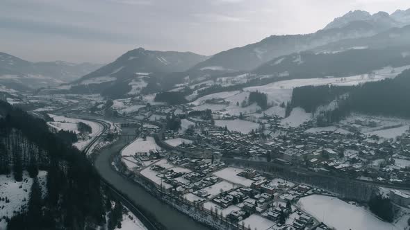 Gloomy Winter  Village Near River Aerial 4k