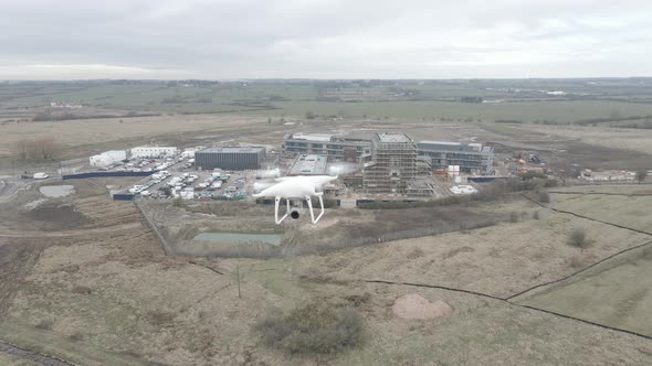 DJI Phantom Drone Flying near a construction site