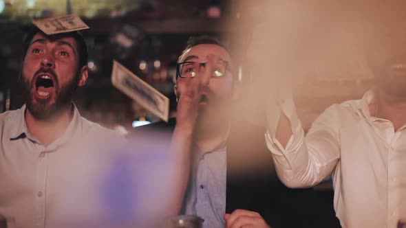 Excited Guys Rejoicing Victory of Team They Supported While Money Falling on Them. Happy Male alt