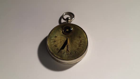 Sundial From the Rays of the Sun Show Time. White Background. Close Up alt