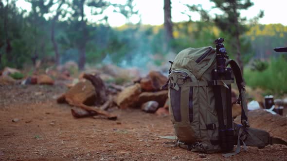 Camera Backpack with camp fire background