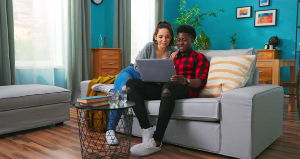Portrait of Positive Cute Lovely Couple Man and Woman in Good Mood Speaking and Smiling alt