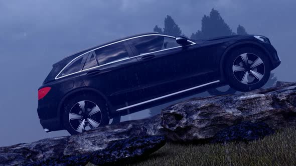 Black Luxury Off-Road Vehicle Standing in Rainy, Mountainous Foggy Field