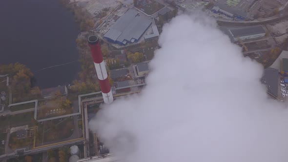 Smoke Comes From the Chimney. Aerial. Air Pollution. Ecology. Kyiv. Ukraine. alt