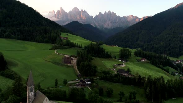 Aerial Drone video of Santa Magdalena St Maddalena Val di Funes in Dolomites Italian Alps alt