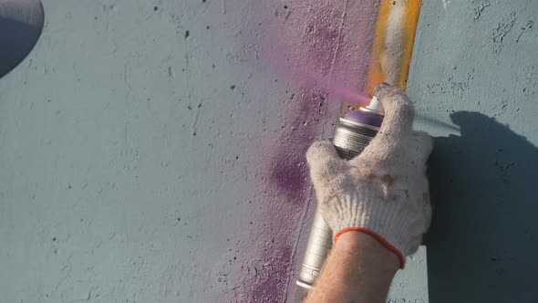 Artistic painting of walls on the street. Graffiti. alt