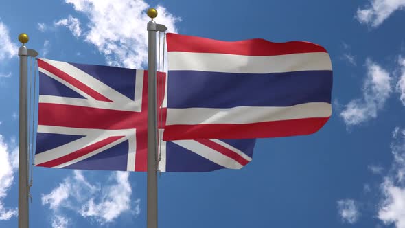 United Kingdom Flag Vs Thailand Flag On Flagpole alt