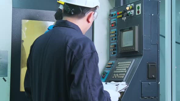 Professional engineering walking discuss inspecting with engineer team machinery factory area. alt