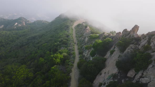 Two Persons Hiking Outdoor By Cinematic Green Mountain Trail  Outdoor Nature alt