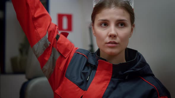 Doctor Sitting in Ambulance Car alt