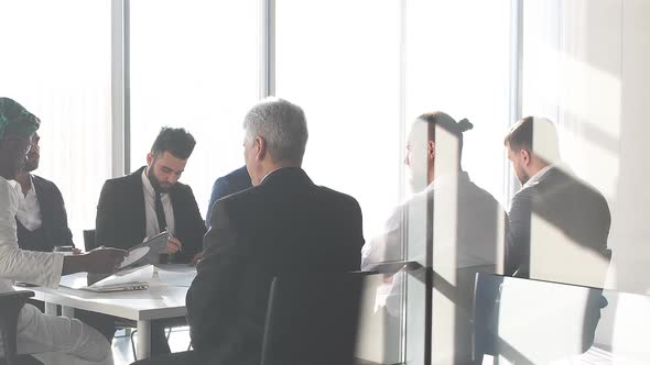 Young Successful Architect Offers a New Project for Businessmen alt