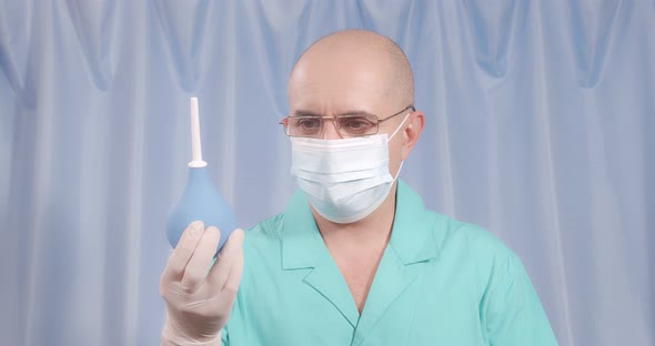 The Doctor Cannot Make a Choice Between a Large and a Small Enema alt