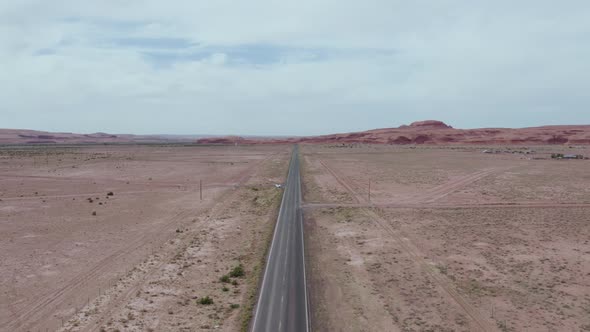Straight Road on Desolate Southwest Utah Desert - Aerial alt