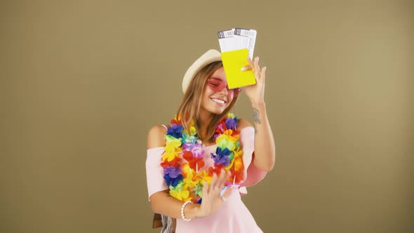 Young Girl in Hawaiian Beads Lei and Backpack alt