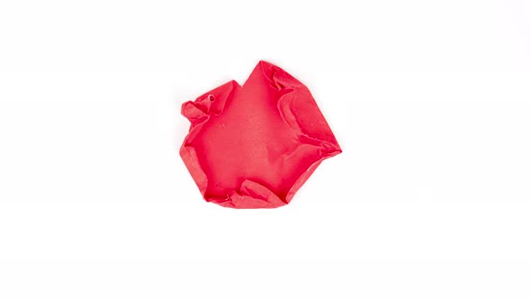 Stop motion animation Red paper ้้heart beat wrinkles making a paper ball