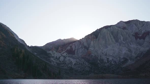 Static Shot of Convict Lake California As Sun Sets Over Mountain Peak