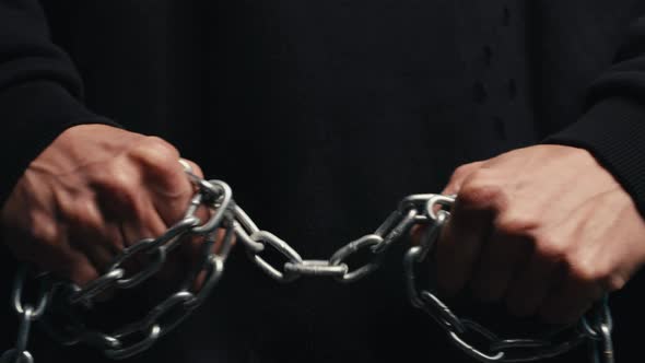 Hands Hold Iron Chain alt