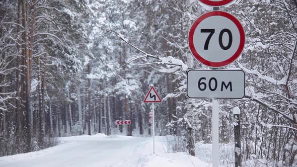 Prohibitory Road Signs on Winter Road