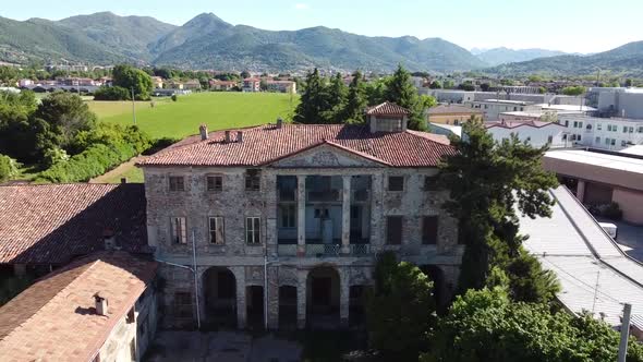 Aerial Shot Of An Abandoned Historic Villa, Video Moving Away From A Ruined Italian Building