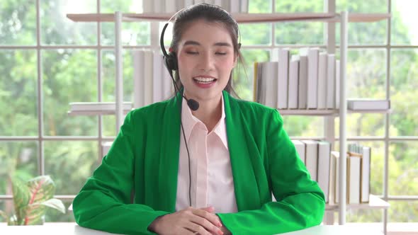 Video Call Camera View of Businesswoman Talks Actively in Videoconference alt