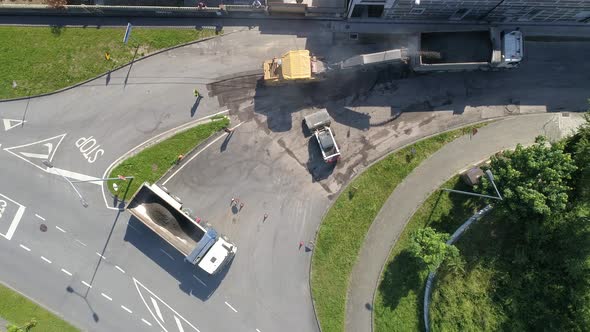 The movement of machinery. Aerial view of the construction road. alt