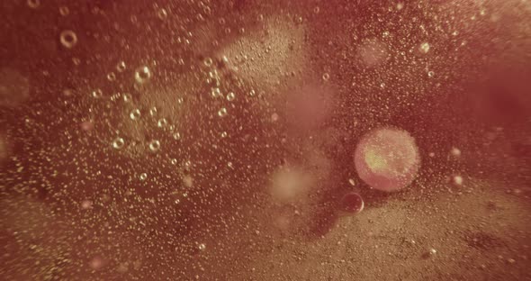 Red Oil Bobbles Fizzing and Exploding