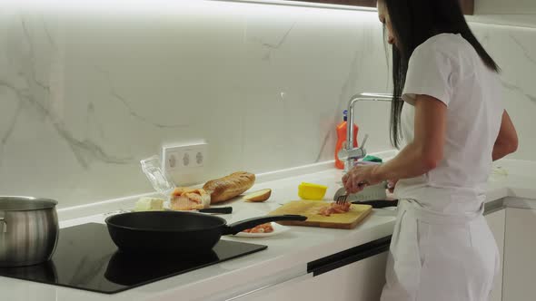 Woman Cooking Bruschetta for Breakfast