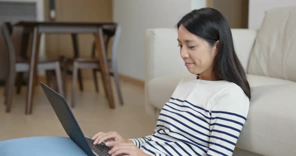 Woman work on computer at home alt