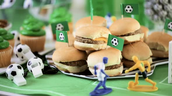 Kids football party set with snacks and drinks. alt