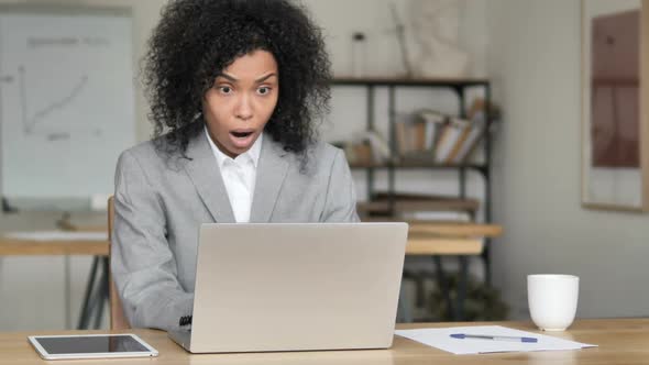 Shocked African Businesswoman Astonished By Loss alt
