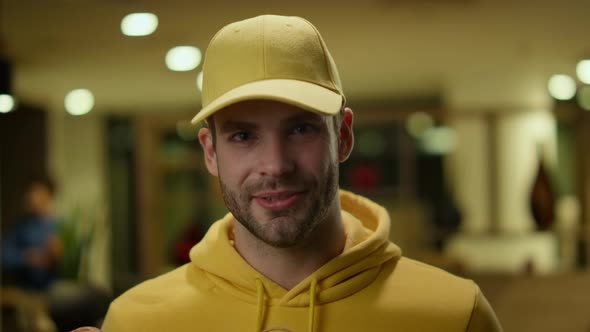 Young Courier Smiling at Camera alt