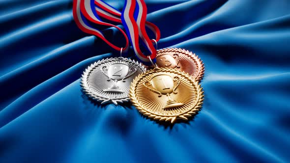 Set of gold, silver and brown medals for winners. First three prizes. Trophies. alt