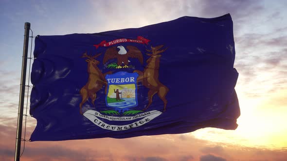 Flag of Michigan Waving in the Wind Against Deep Beautiful Sky at Sunset alt