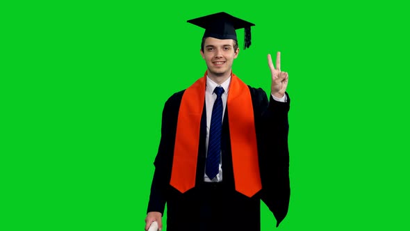 Cheerful Smiling Graduate Student Walking And Showing V Sign 
