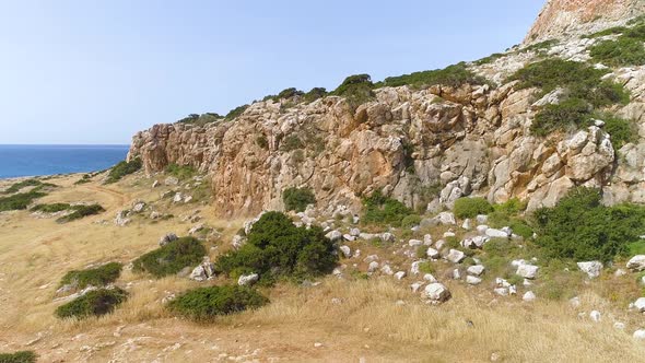 Steep Rocky Cliff Beautiful Tourist Landscape alt