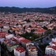 Aerial Drone View Over Red Roof Tiled Buildings on the Background of Mountains - VideoHive Item for Sale