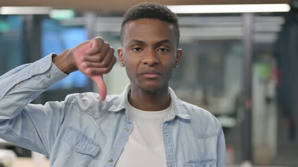 Thumbs Down by African Man alt